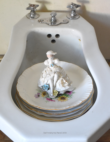 art installation - bidet, plates, figurine- Piet.sO 2018.