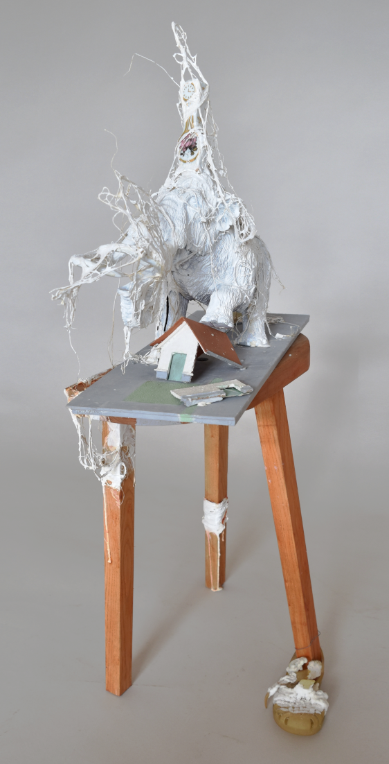 Composite sculpture of a mammoth crashing a house, decorative elefant figurine revisited, contemporary art about time, french artist Piet.sO